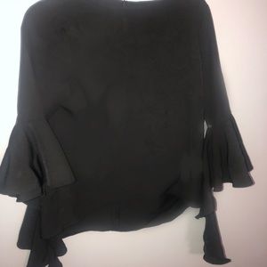 Black silky blouse with dramatic sleeves!